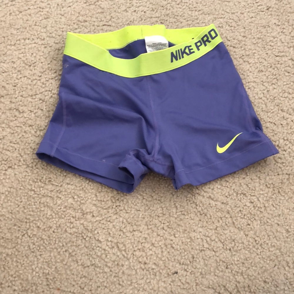 Purple and green Nike pro shorts